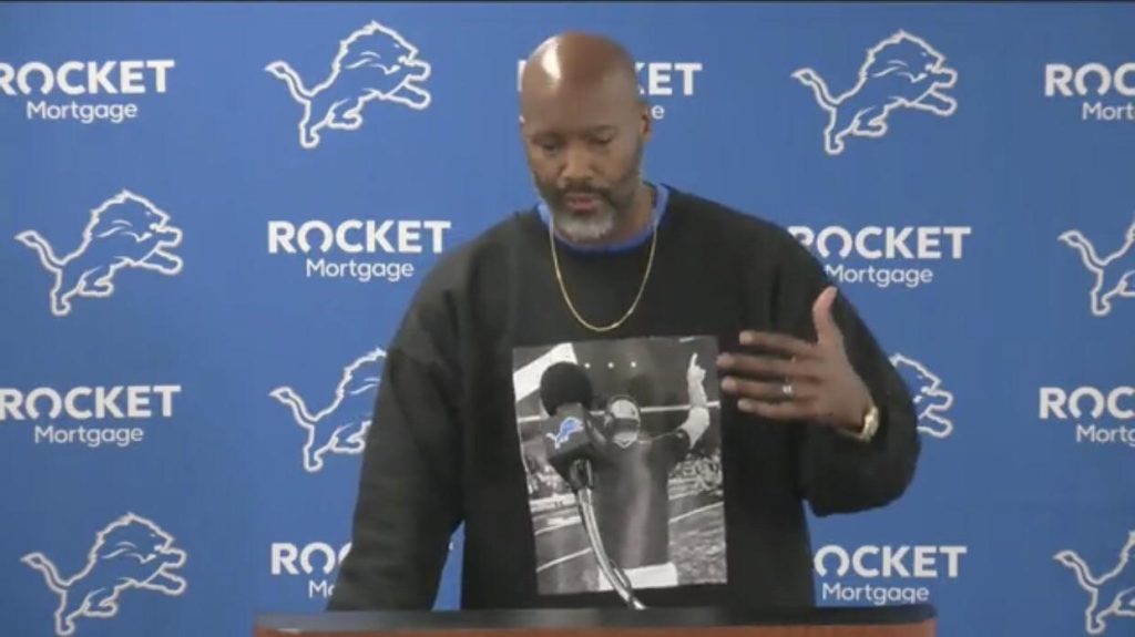 Brad Holmes in Dan Campbell shirt